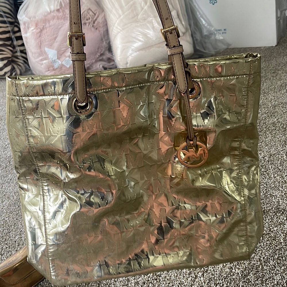 Gold michael kors reflective tote bag